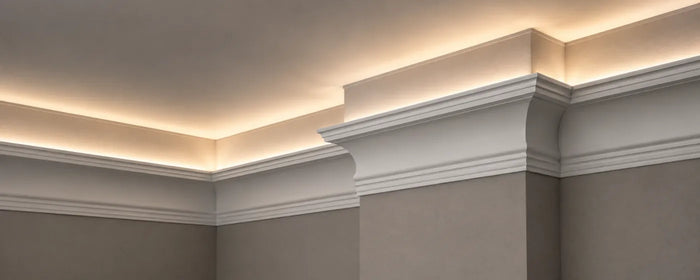 Crown moulding with concealed LED cove lighting at a wall corner